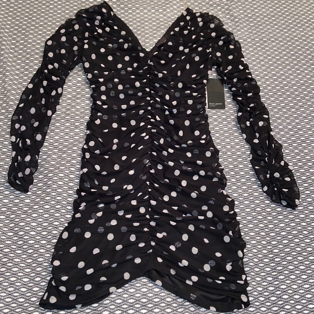 Free press Black and white polkadot rushed long sleeve dressed in size small.